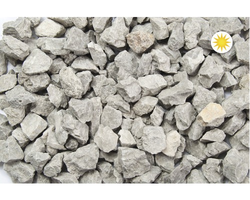 Sivý drvený kameň ako voľne ložený materiál