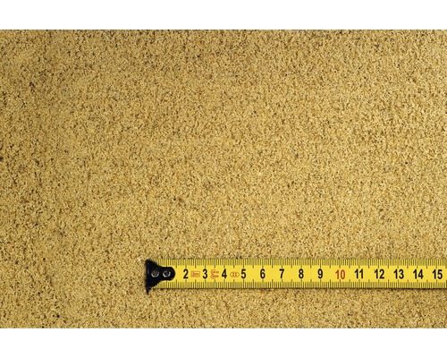 Poterový piesok so žltým zvinovacím metrom