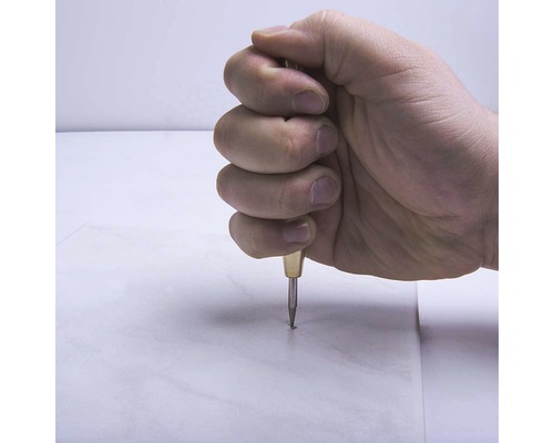 Ruka umiestňujúca jamkovač na obrobok