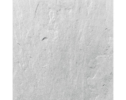 Detail svetlého betónového povrchu s hrubou textúrou.