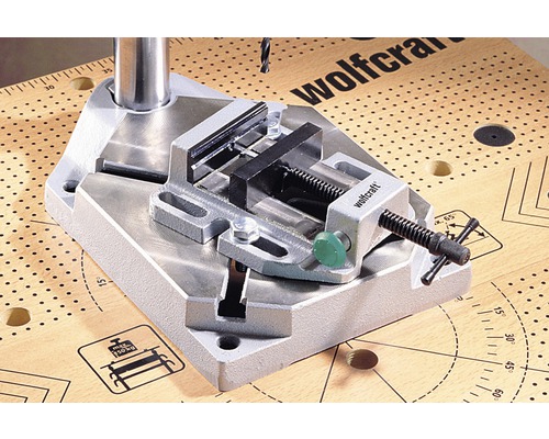 Vŕtací stojan Wolfcraft so zverákom na pracovnom stole