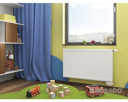 Doskový radiátor Korado Radik VK 22 600 x 400 mm 2 spodné prípojky Detská izba s radiátorom, hračkami a regálom