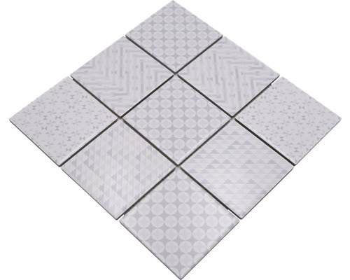 Vzor z deviatich štvorcových dlaždíc s rôznymi geometrickými vzormi