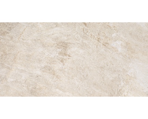 Detail béžovej kamennej dlaždice s mramorovou štruktúrou.