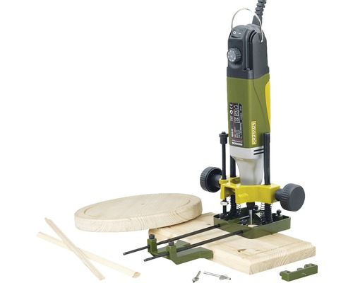 Horná frézka Proxxon s príslušenstvom na drevenom podklade