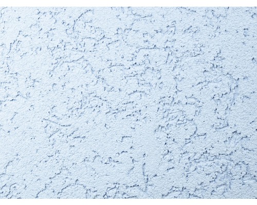 Detail omietkovej fasády so škrabanou omietkovou štruktúrou