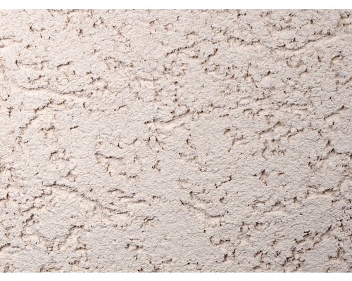 Detail steny s hrubou omietkou