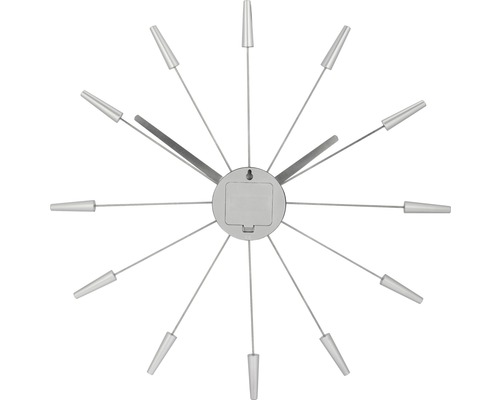 Nástenné hodiny s dekoratívnymi prvkami v tvare lúčov