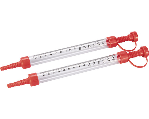 Dva dávkovacie nástroje s meracou stupnicou