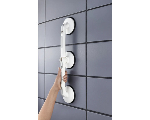 Držiak s prísavkou na obkladanej stene s rukou