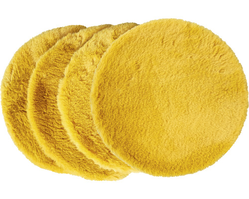 Štyri žlté plstené klzáky na nábytok