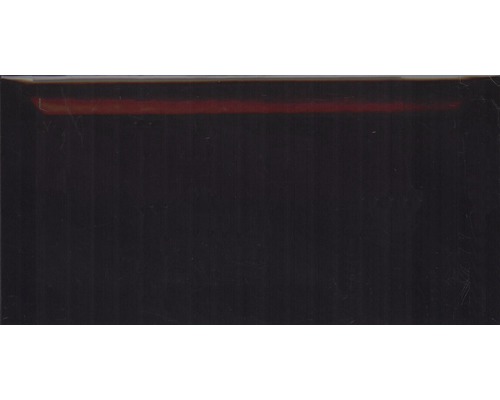 Obklad Metro black 10x20 cm Tmavý povrch s tenkým prúžkom v hornej časti