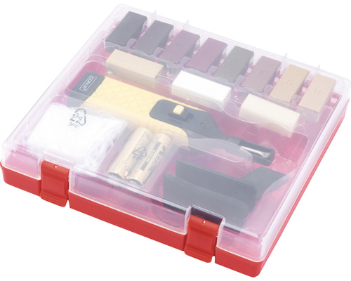 Súprava na opravu nábytku v červenej krabici s rôznymi opravnými nástrojmi