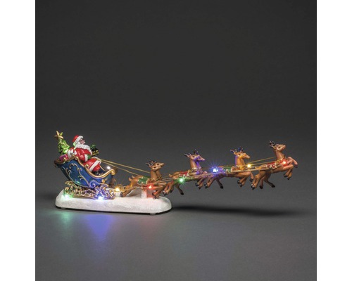 Dekorácia Konstsmide Santa Claus so sobím záprahom na batérie 10 LED 35,5 cm farebné svetlo Dekorácia Konstsmide Santa Claus so sobím záprahom na batérie 10 LED 35,5 cm farebné svetlo