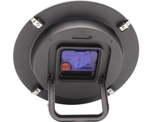 Pohľad zozadu na stolové hodiny so stojanom