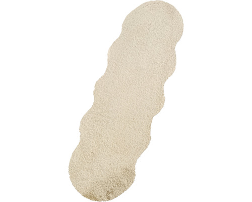 Béžový koberec so zvlneným okrajom