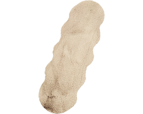 Béžový kúpeľňový koberec s vlnitým okrajom