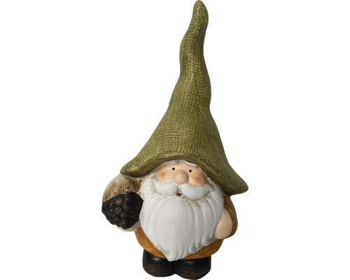 Záhradný trpaslík s čiapkou a bradou drží žaluď