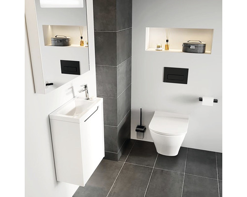 Moderná kúpeľňa s bielym umývadlom, toaletou a sivou dlažbou