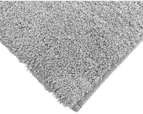 Detail šedého koberca s vlasom