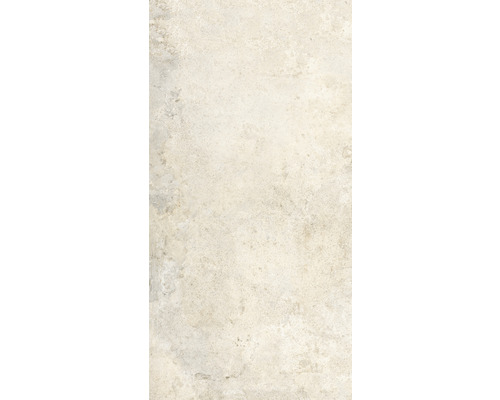 Detail svetlej kamennej dlaždice.