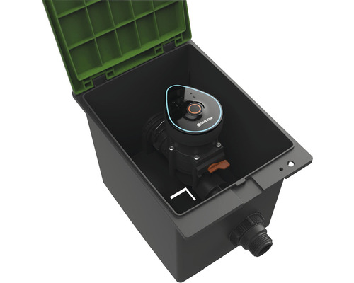 Riadiaca jednotka zavlažovania Gardena v krabici s otvoreným vekom