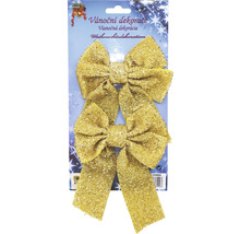 Dve zlaté mašle na vianočnú dekoráciu na obale.