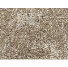 Detail béžového koberca.