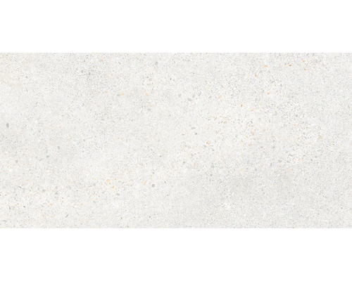 Detail svetlej podlahovej dlaždice s jemnou kresbou