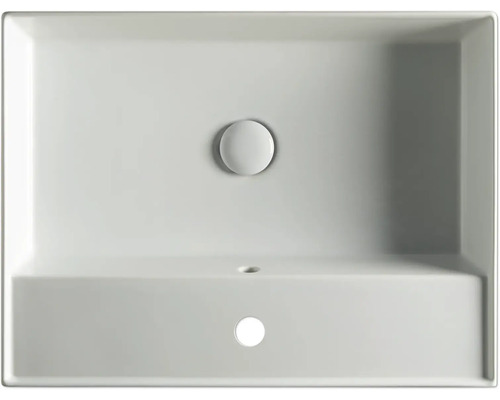 Pohľad zhora na obdĺžnikové umývadlo z keramiky s odtokovou armatúrou