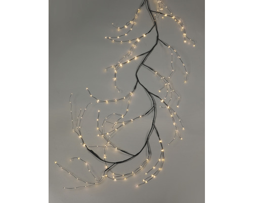 Dekoratívna svetelná reťaz v tvare konára s teplými bielymi LED