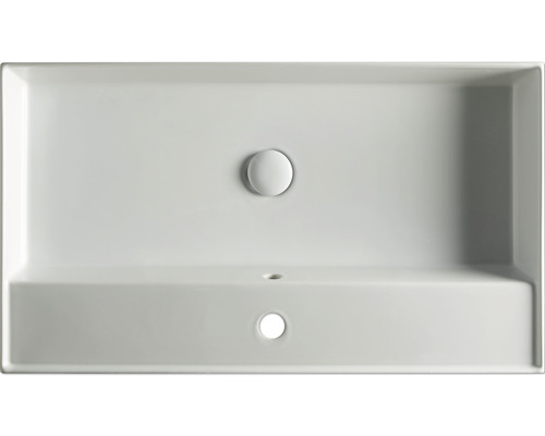 Pohľad zhora na obdĺžnikové keramické umývadlo so zátkou