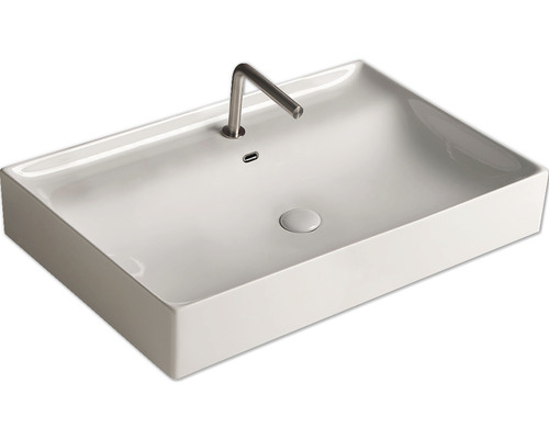 Obdĺžnikové umývadlo na dosku s vodovodnou batériou