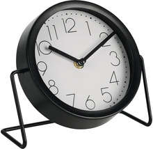 Stolové hodiny s kovovým rámom a ciferníkom