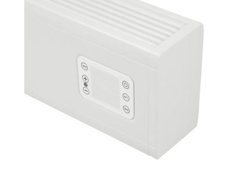 Detailný pohľad na biely radiátor s ovládacím panelom.