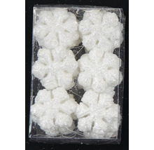 Balenie šiestich bielych trblietavých snehových vločiek