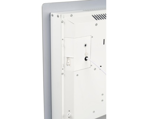 Detail zadnej strany vykurovacieho telesa s vypínačom a napájacím káblom