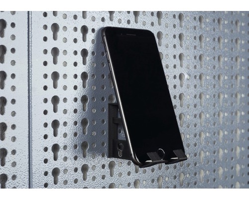 Držiak telefónu na dierovanej stene s mobilným telefónom