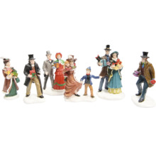 Dekoratívna skupina figúrok vo viktoriánskom štýle s vianočnými darčekmi