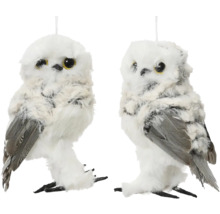 Dve biele dekoratívne sovy na zavesenie