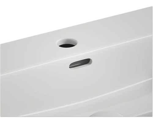 Detail umývadla s otvorom pre batériu a prepadom