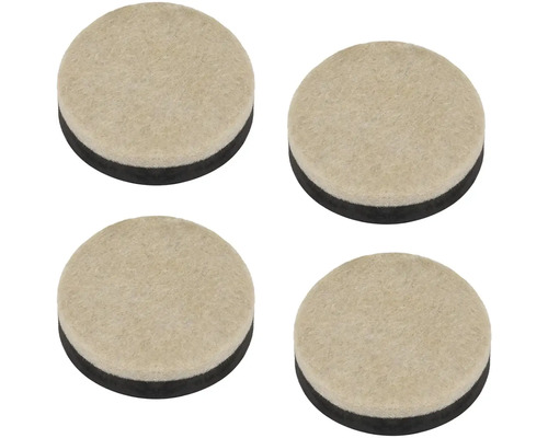 Štyri plstené klzáky na nábytok s priemerom približne 25 milimetrov.