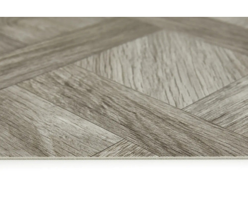 Detail vinylovej podlahy so vzorom rybej kosti