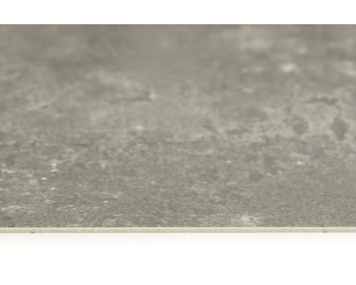 Detail šedej podlahovej dlaždice