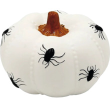 Dekoračná tekvica s motívom pavúkov na Halloween