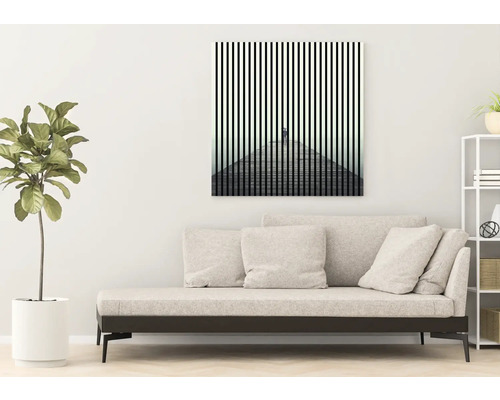 Dekoratívny nástenný obraz s abstraktným zobrazením v obývacej izbe.