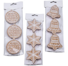 Balenia s vianočnými ozdobami v tvare gúľ, hviezd a zvončekov