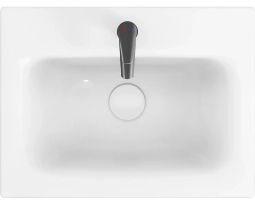 Biele umývadlo na dosku s batériou zhora