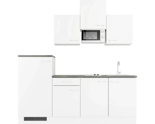 Biela kuchynská linka s drezom, sporákom a mikrovlnnou rúrou