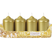Štyri zlaté stĺpové sviečky v balení na Vianoce.